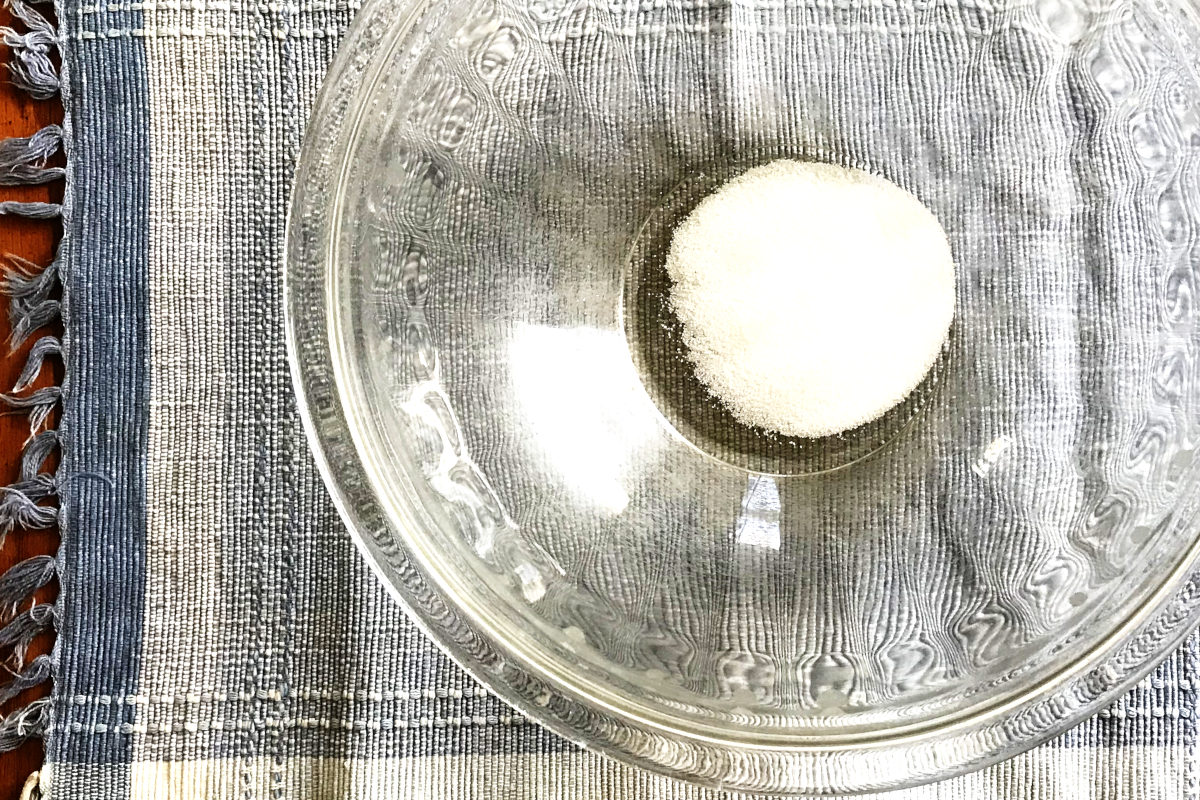 sugar in mixing bowl on placemat