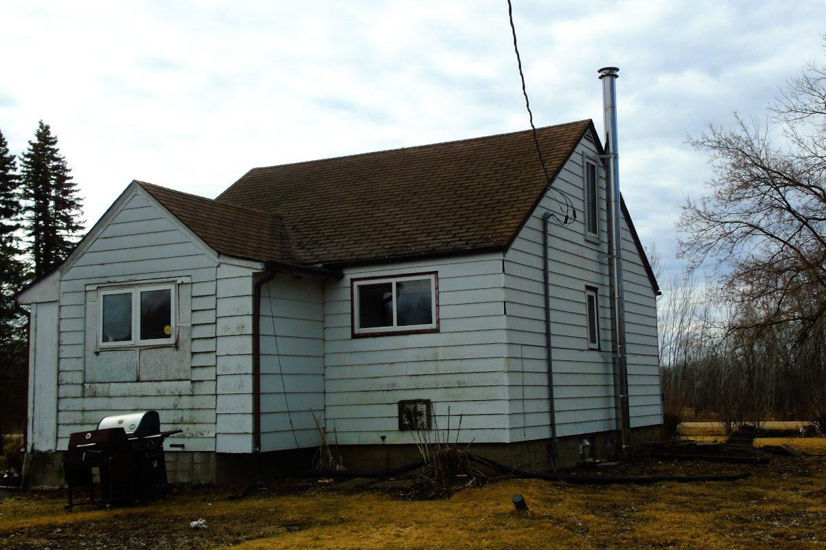old one and a half story house before renovations
