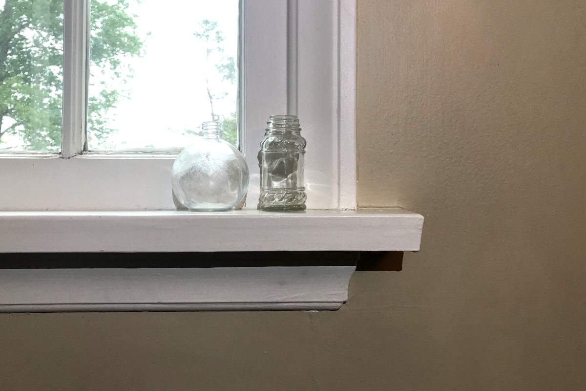 piano window with casing details and mullens in old house remodel