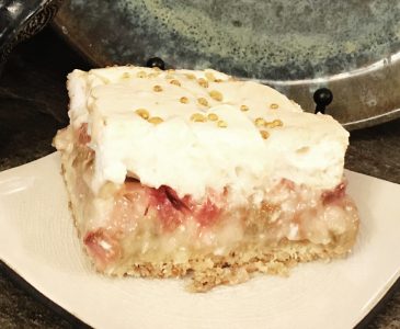 piece of rhubarb dessert on white plate
