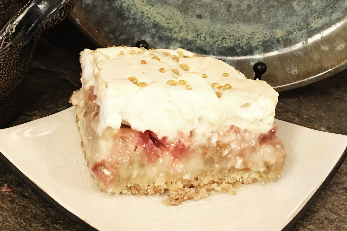 piece of rhubarb dessert on white plate