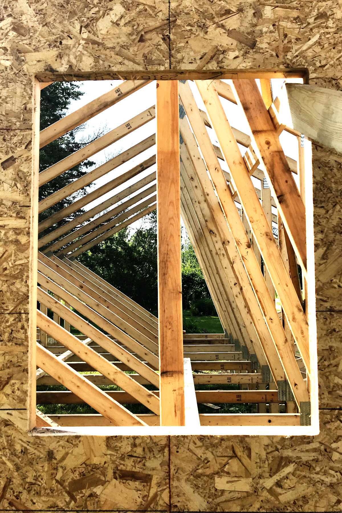 Close-up geometric view of trusses for the addition of the old house remodel