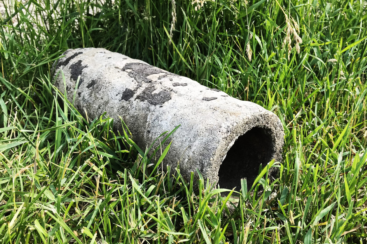 Old concrete pipe about 12" long and 4" across, dug up in the addition for the old house remodel