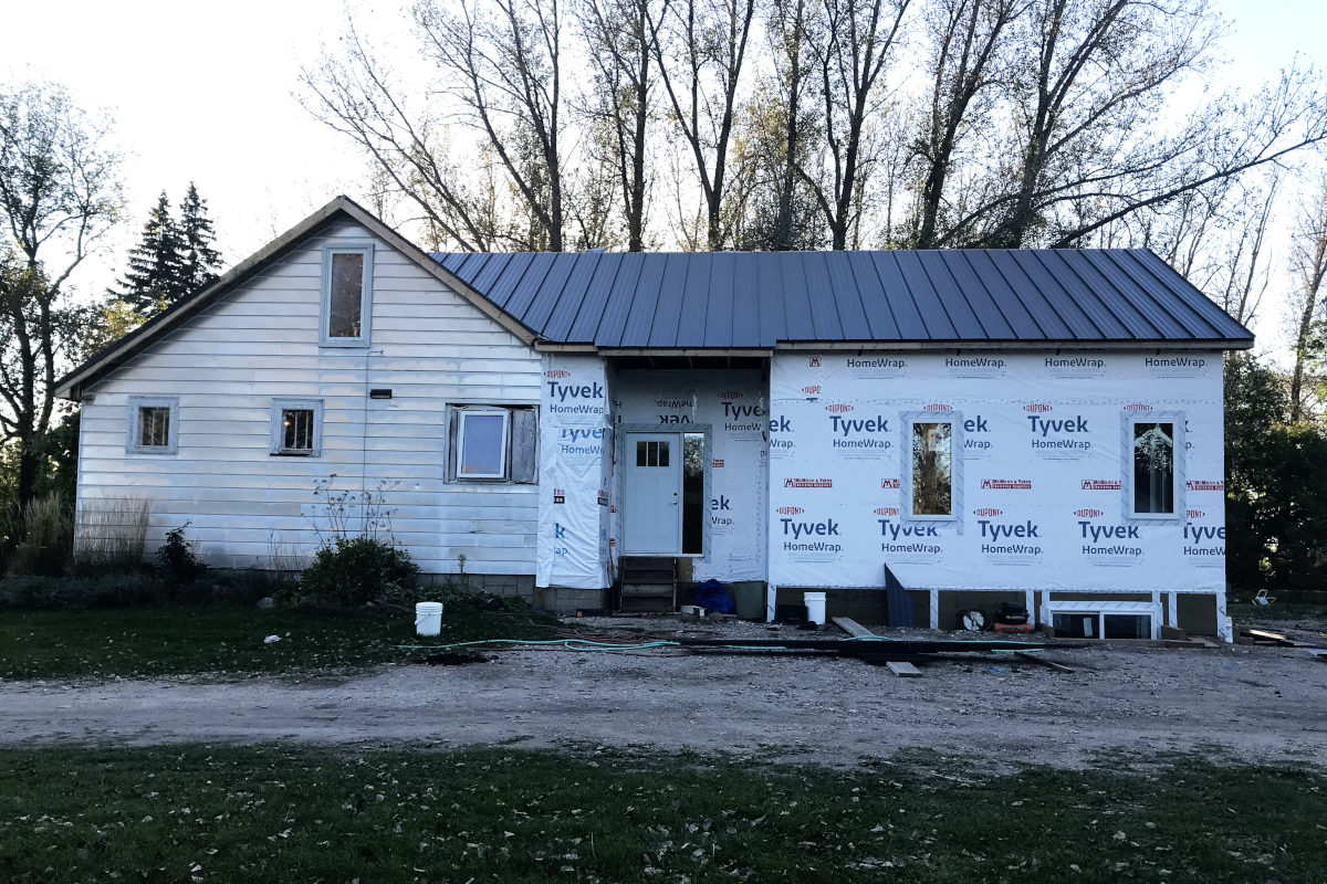 old house remodel with new standing seam roof