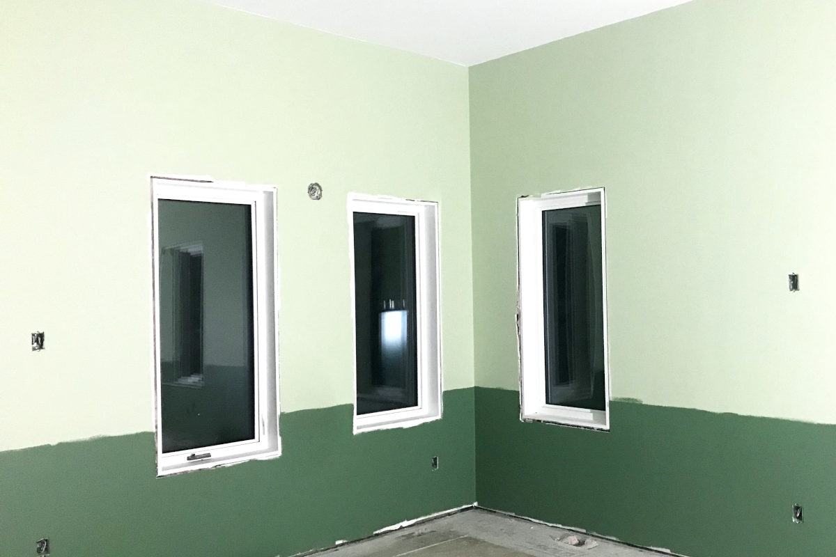 painted walls in old house remodel with restful green on lower three feet and kittery point green on the upper portion.