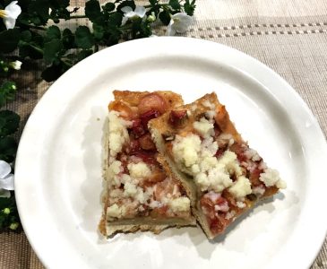 two pieces of platz on a plate with a flowering plant