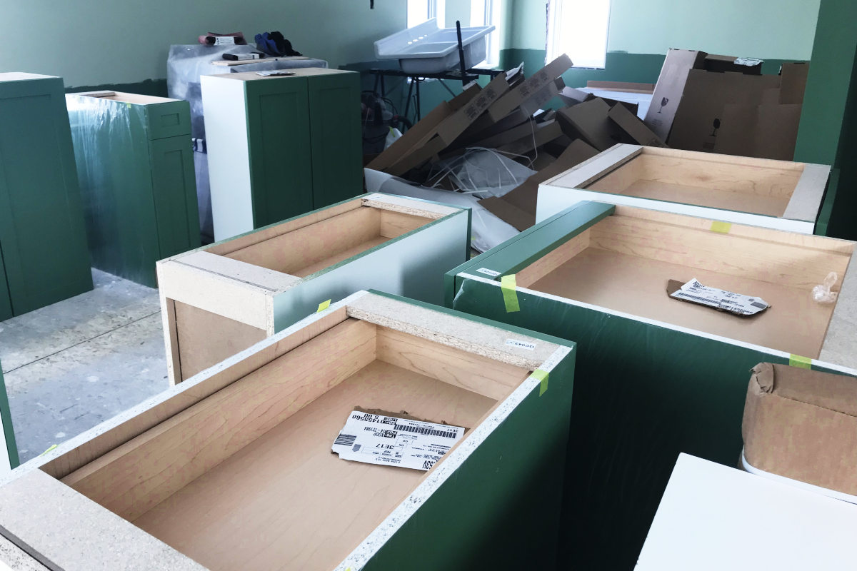 cabinets strewn all over the floor