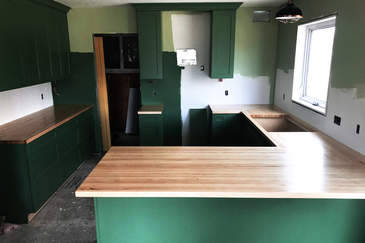 cabinets with with butcher block counters installed