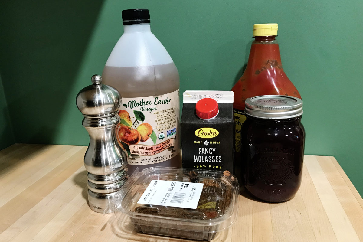 ingredients for chokecherry or chokeberry BBQ sauce on butcher block counter
