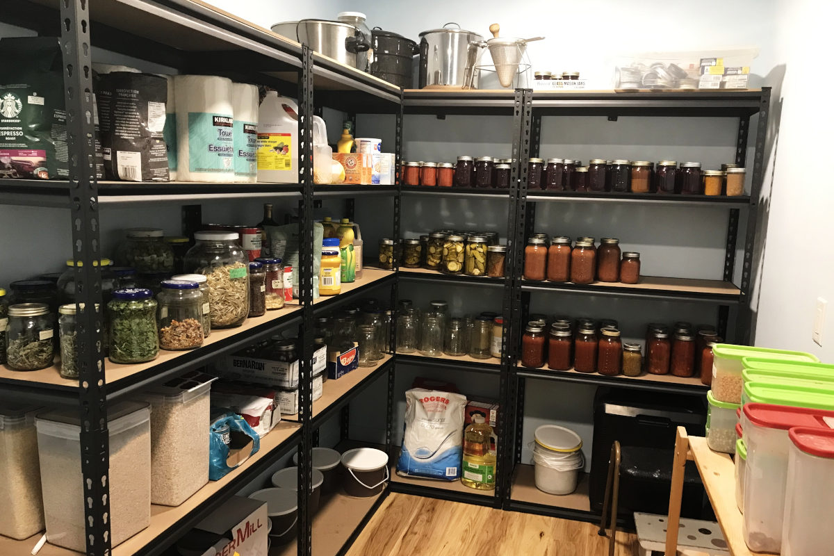 stocked pantry shelving units.