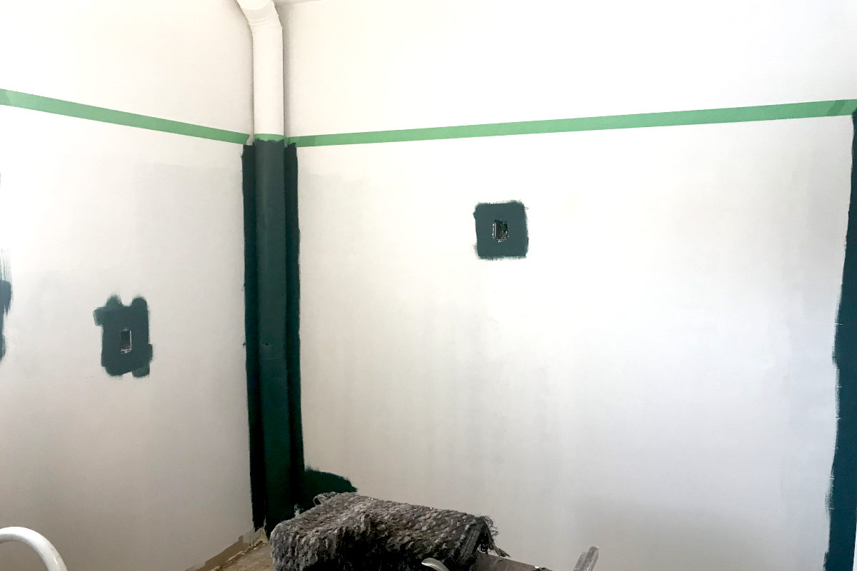 painting the mudroom: taped and cut-in.